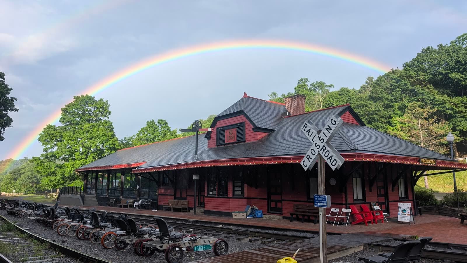 A rainbow over the historic Frostburg depot, seen from the hotel porch