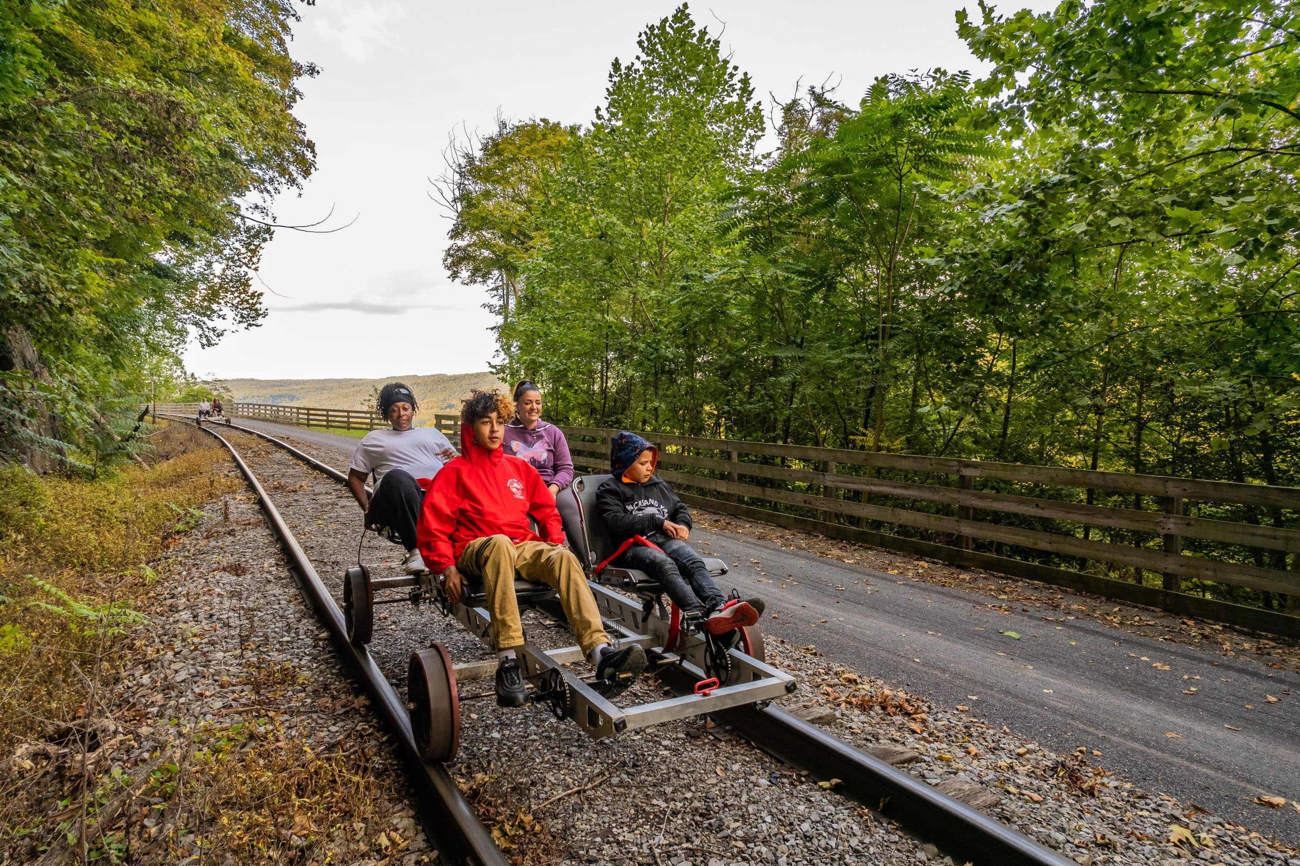Railbikes rolling the rails toward the mountains