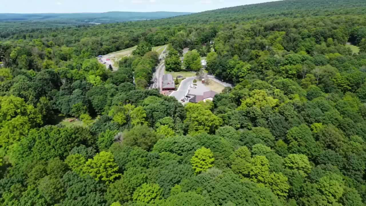 Aerial footage of railbiking, kayaking, the Frostburg depot, and rooms at The Tunnel Hotel